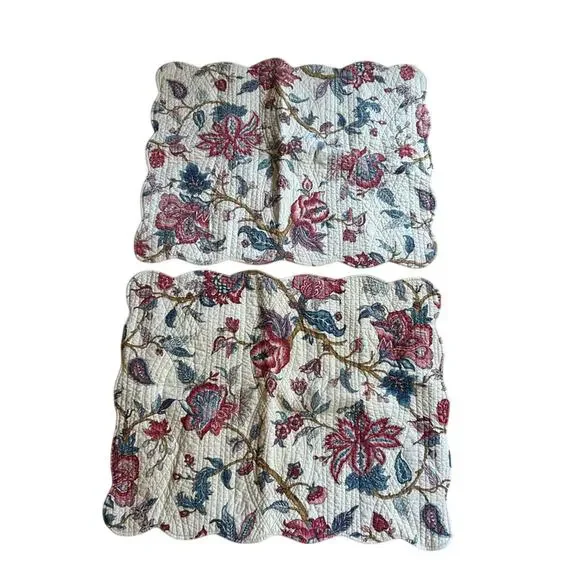 2 quilted floral standard pillow shams from Pottery Barn ?