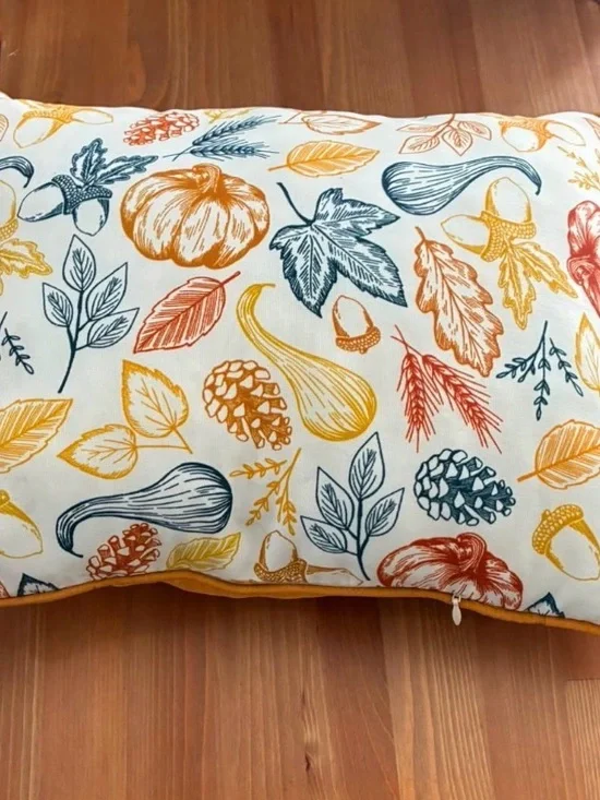 Autumn Harvest Decorative Pillow - White with Orange, Yellow, Blue Leaf Print