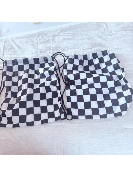 Checkerboard black and white string backpacks