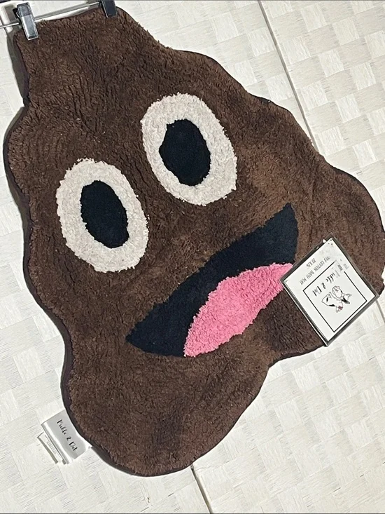 Plush Brown Smiling Poop Emoji Bath Mat with Pink Tongue