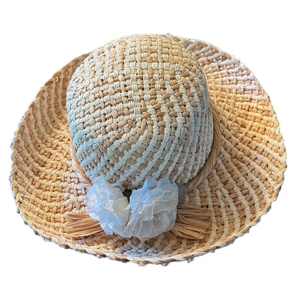Gorgeous summer straw like hat with white flowers like new