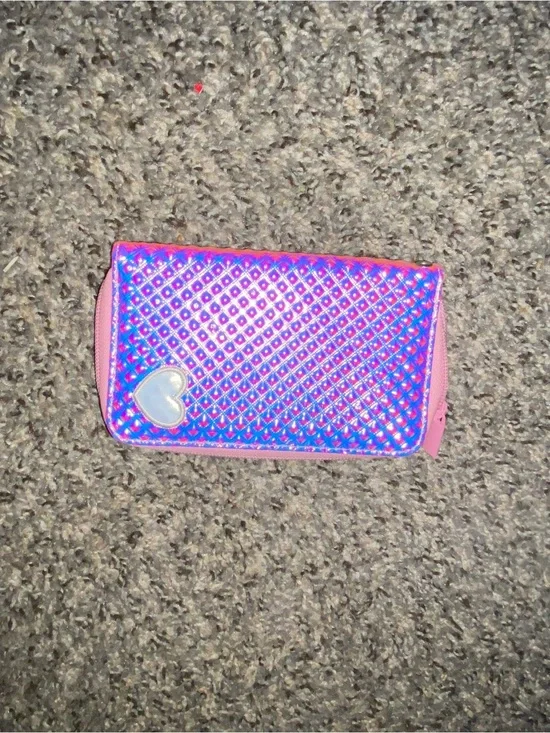 Pink heart embossed wristlet wallet