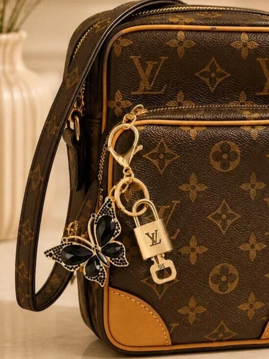 Authentic Louis Vuitton Gold Lock 🔒 Unbranded Butterfly Keychain Bag Charm LV