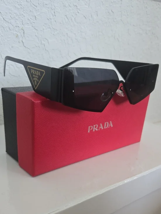 2 Pair Of Sunglasses