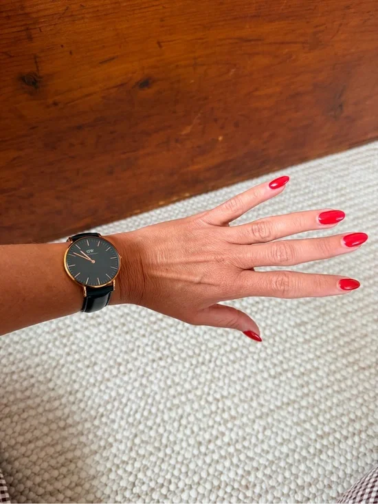 Daniel Wellington Black Dial Watch with Rose Gold Case and Black Leather Strap