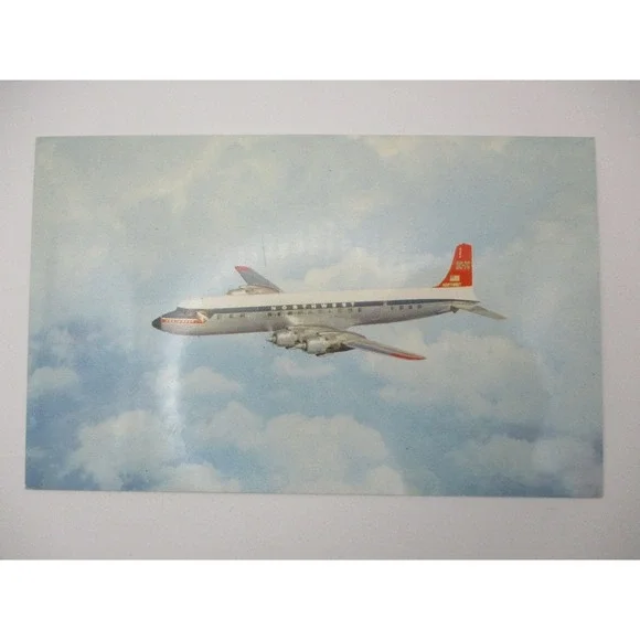 Vintage Northwest Orient‎ Airlines DC-7C Airplane Postcard Plastichrome P25100