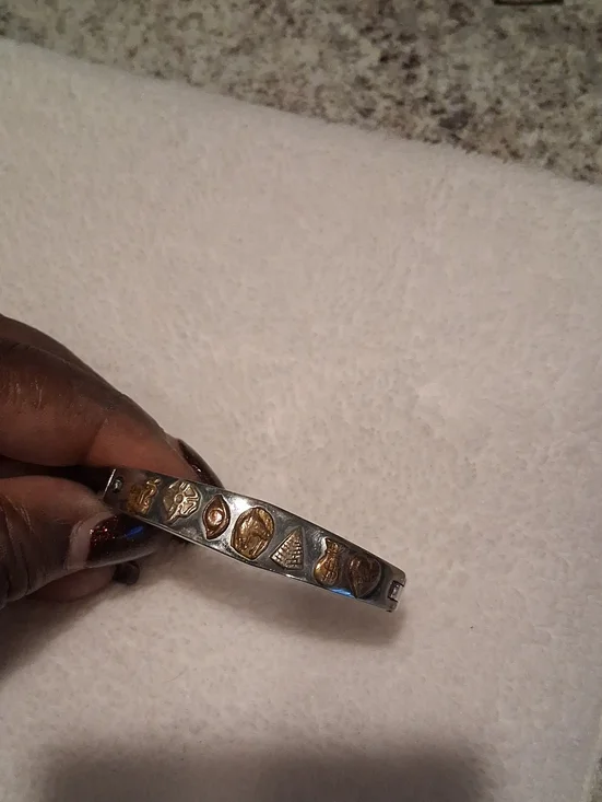 Silver-Tone Bangle Bracelet with Gold Accent Charms