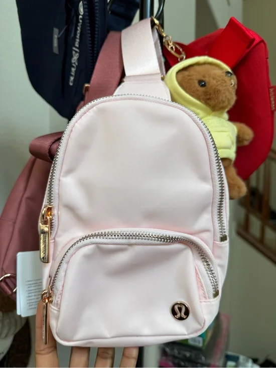 lululemon athletica Light Pink Mini Sling Backpack with Rose Gold Hardware