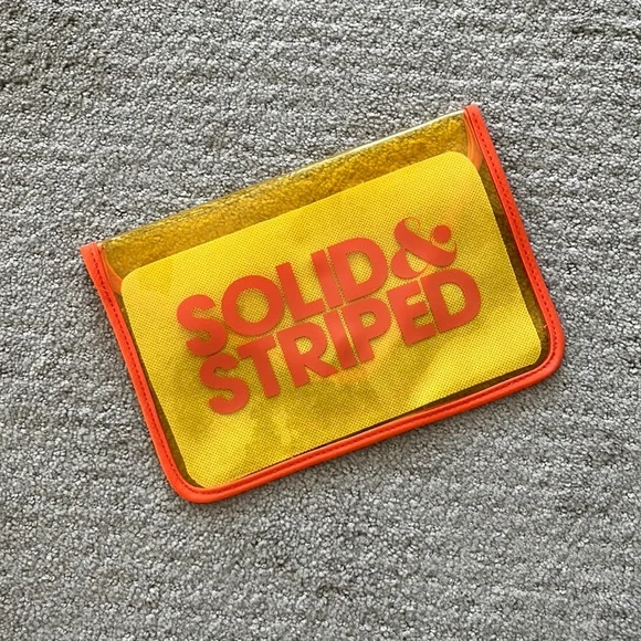 5/$25- Solid & striped wet/cosmetic bag