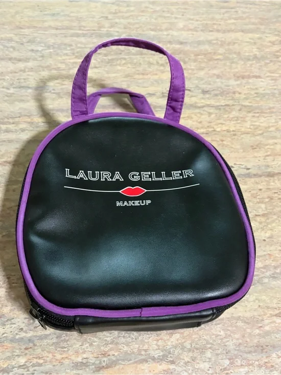 Laura Geller Black Cosmetic Bag with Purple Trim and Handles