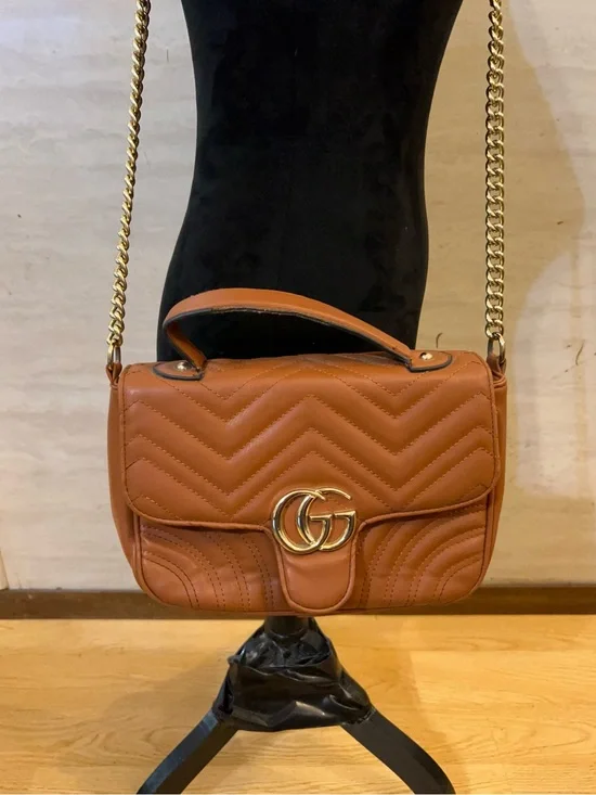 Designer Inspired brown quilted handbag featuring an interlocking double-G logo