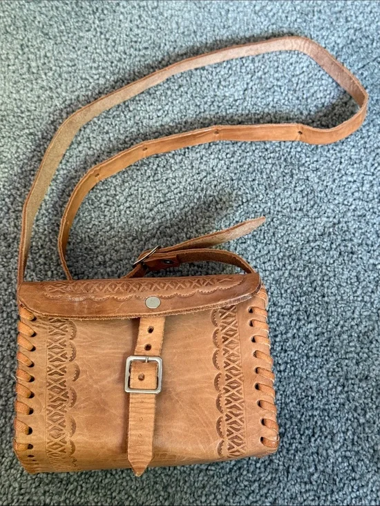 Vintage Tooled Leather Crossbody Bag with Buckle Front.