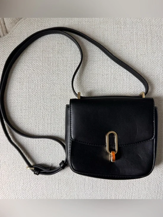 Target Classic Black Mini Crossbody Bag with Gold Hardware and Amber Accent