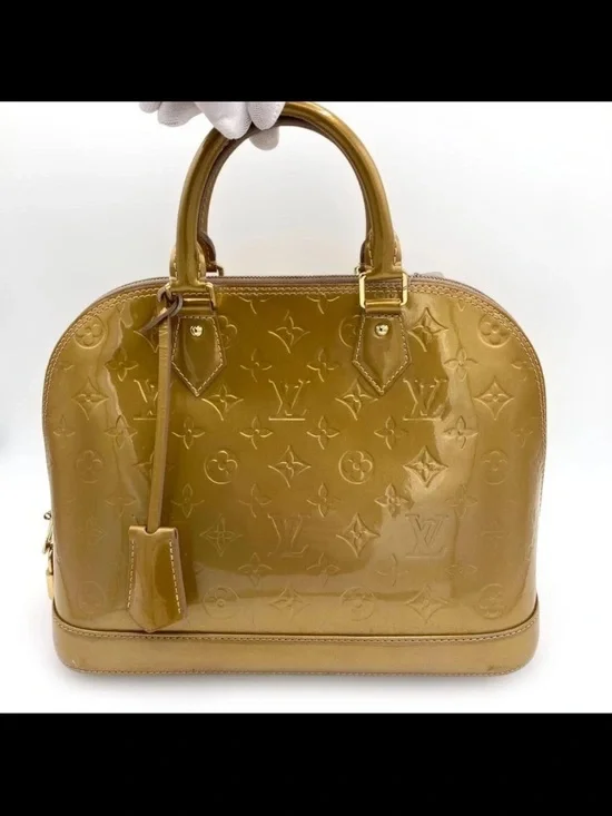 Louis Vuitton Vernis Alma PM Leather Satchel in Mustard