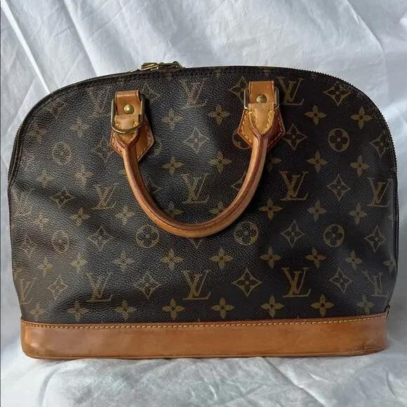 Louis Vuitton Alma PM Monogram Handbag