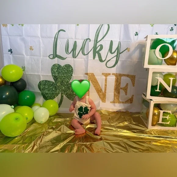 Lucky one first birthday cake smash outfit and decor