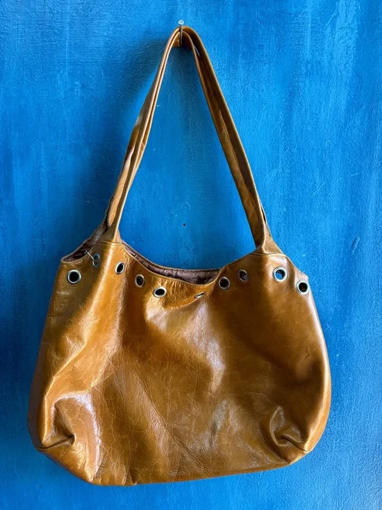 Women’s Tan Leather Shoulder Bag with Grommet Detail