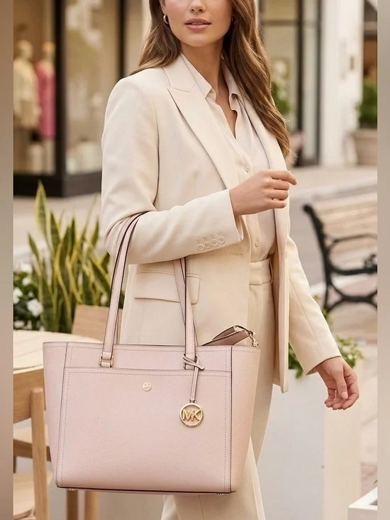 New Michael Kors Maisie Large Pebbled Leather tote, clutch purse not included.