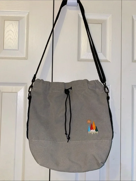 Gray Canvas Drawstring Tote with Embroidered Accent