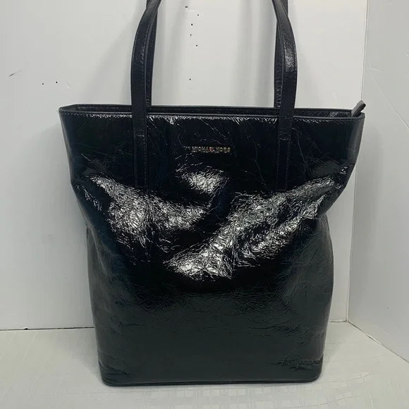 Michael Kors a black Vertical Tote.