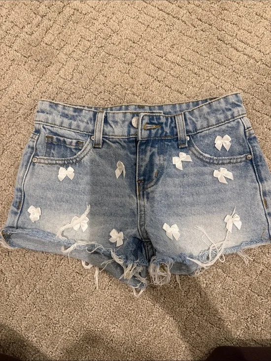 RSQ Light Blue Denim Shorts with White Bow Appliqués