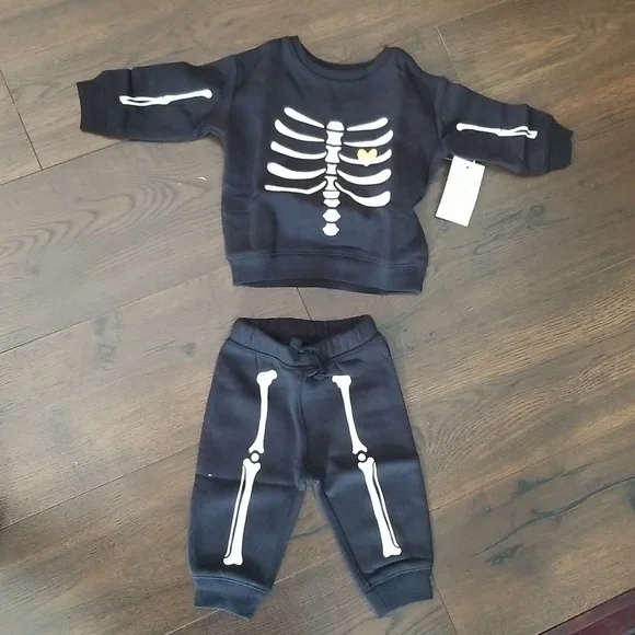 2 piece skeleton Halloween outfit, size 6 months, black and white, new.