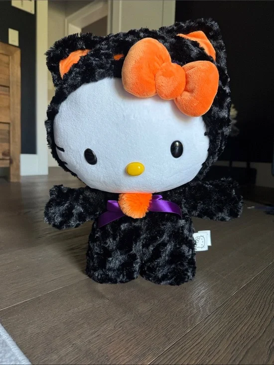Sanrio Hello Kitty Black & Orange Plush Costume with Purple Bow