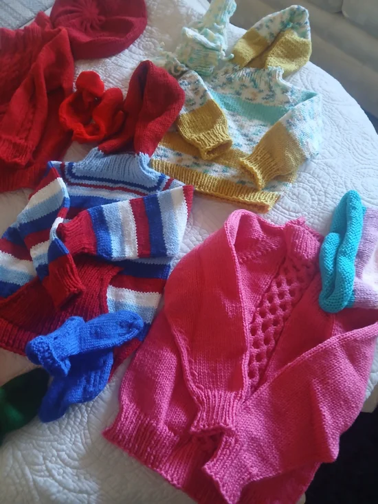 Various handknit toddler winter wear