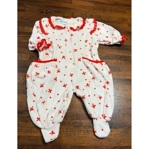 Vintage Carters baby girls newborn sleeper, ruffles with bows and hearts.