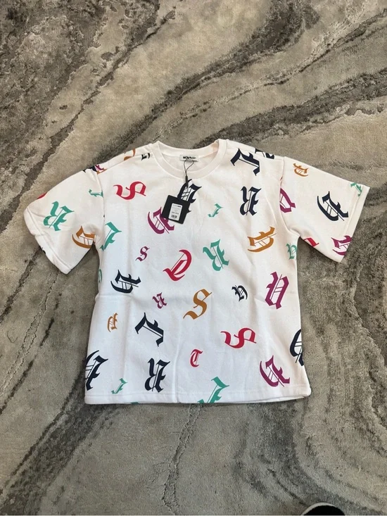 Fashion Nova Kids White Graphic Logo Tee with Multicolor Letters