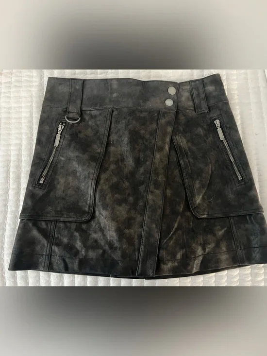 NWOT Free People Distressed brown (coffee color) suede like mini skirt.