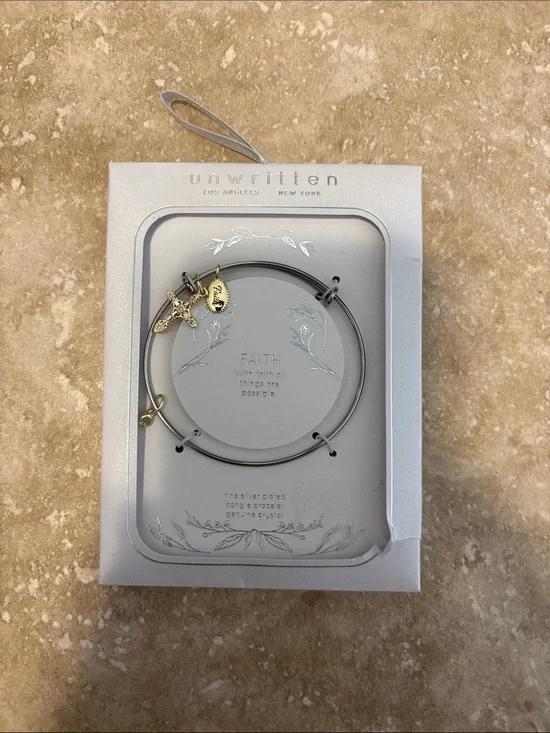 Unwritten Silver Bangle Bracelet with Gold Cross & Charm Accents