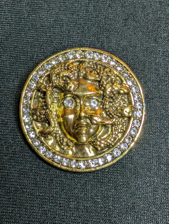Gold Medusa-Style Round Pin with Rhinestone Border