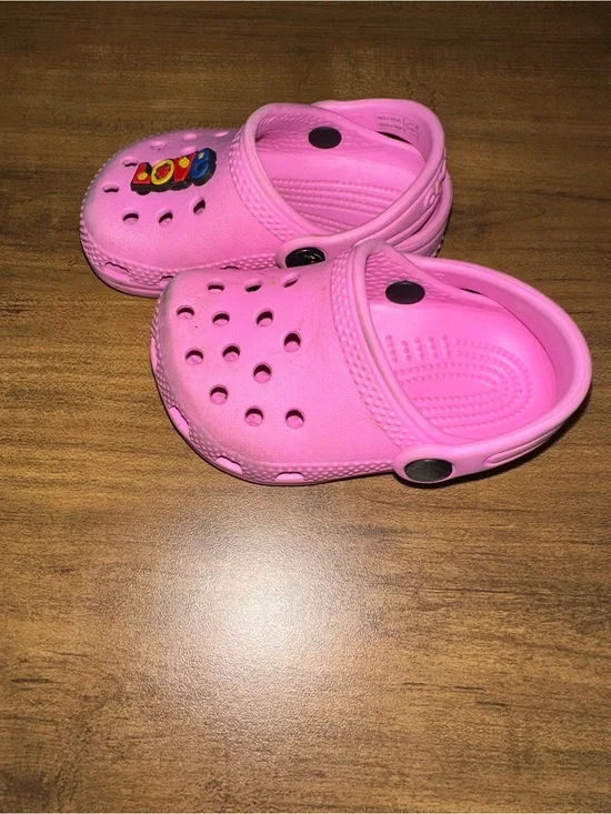CROCS Kids Pink Slip-On Clogs with Colorful Love Charm