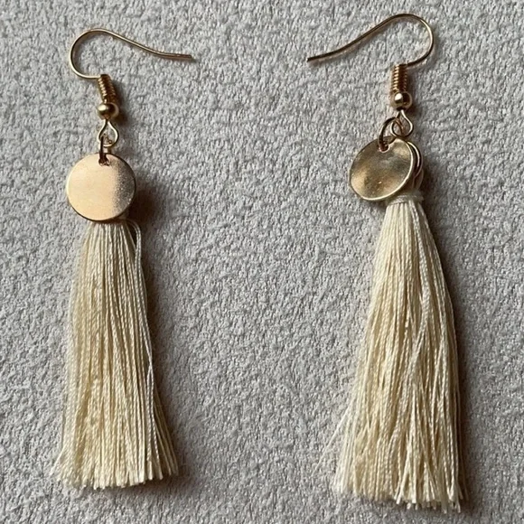 White tassel earrings + gold accent