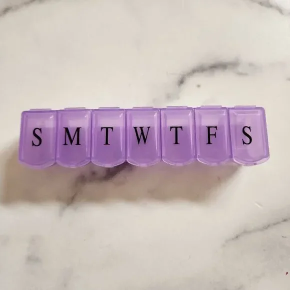 Purple clear plastic pill case 7-Day single row