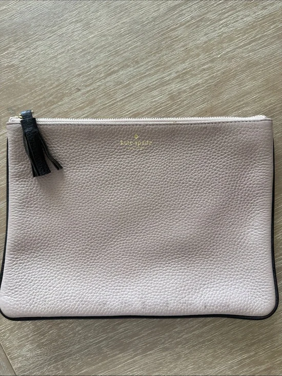 kate spade blush pink pebbled leather clutch with black tassel trim