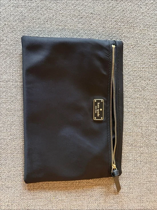 kate spade black nylon toiletry clutch with gold-tone hardware