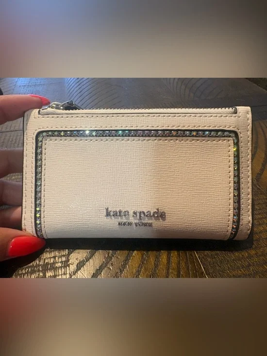 kate spade cream wallet with crystal border