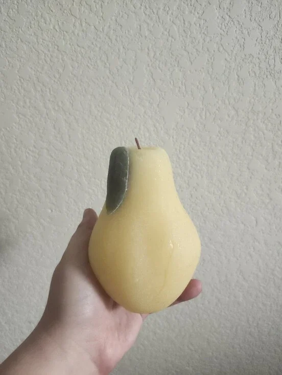 Target Yellow Pear-Shaped Decorative Candle with Green Leaf Accent