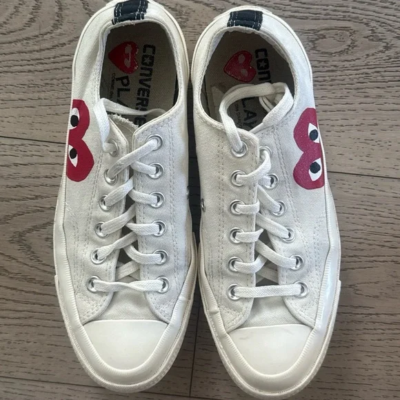 Comme Des Garçons Converse Women’s White Canvas Sneakers with Red Heart Graphic