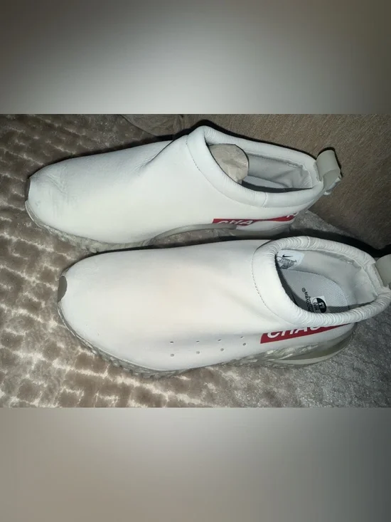 Nike White Slip-On Men’s Athletic Sneakers with Red Accent