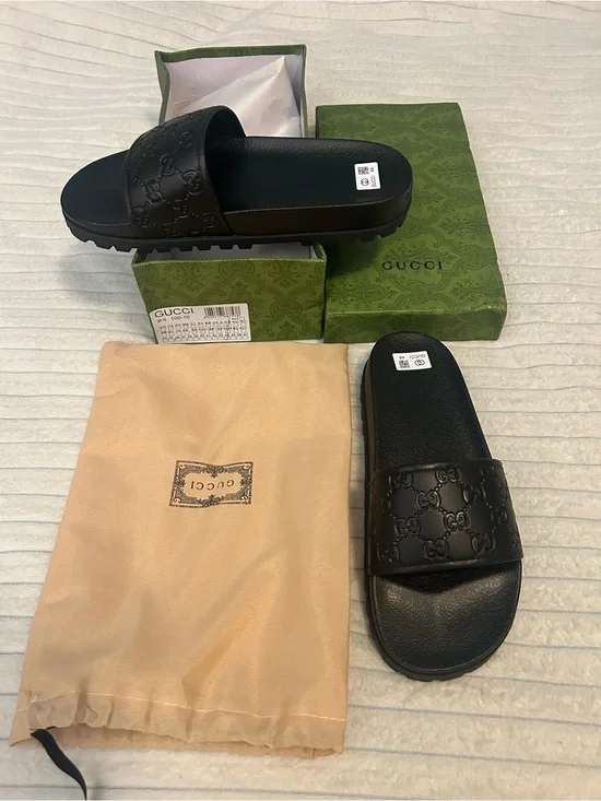 Gucci Black Embossed GG Men’s Slide Sandals