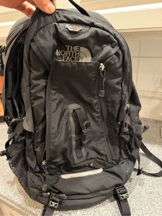 The North Face Black Men's Backpack - Durable Everyday Pack (Surge)