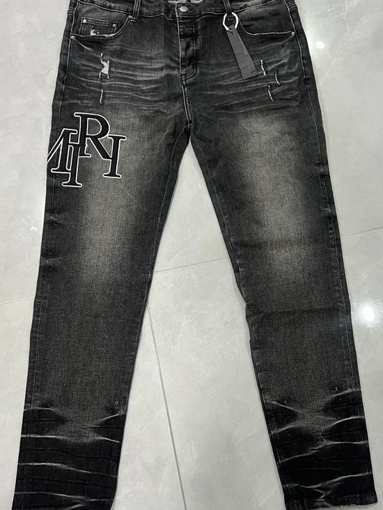 AMIRI Black Washed Stacked Logo Skinny Jeans. Perfect condition