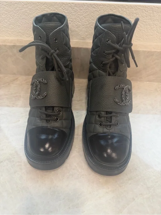 CHANEL Black Quilted Leather Combat Boots with Patent Toe