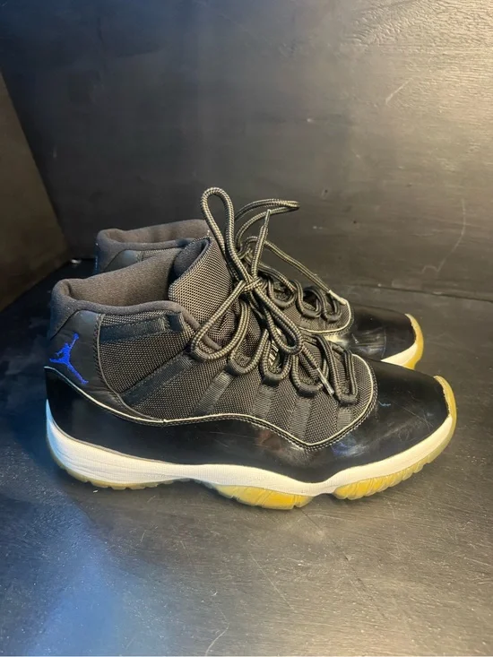 Jordan 11 Men’s Black Sneakers with Blue Jumpman