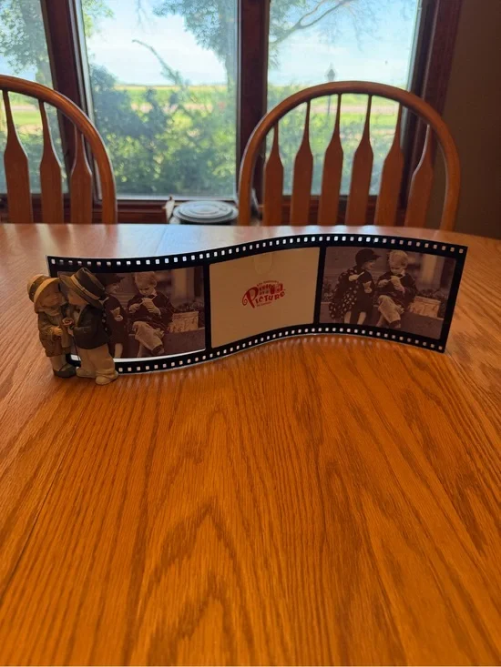 Vintage Black Filmstrip Photo Frame with Figurine Accent
