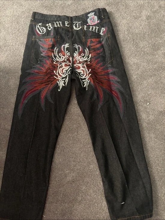 Embroidered Black Men’s Jeans with Red Wing Design
