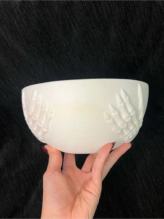 White Ceramic Decorative Bowl with Sculpted Skeleton Accents